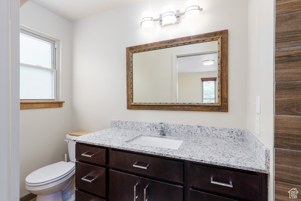 Bathroom with toilet and vanity