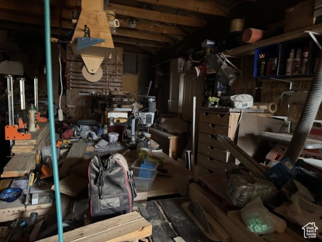 Miscellaneous room with a workshop area