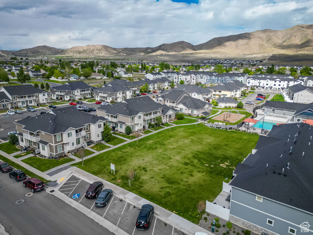 Aerial view of residential area with a mountain backdrop
