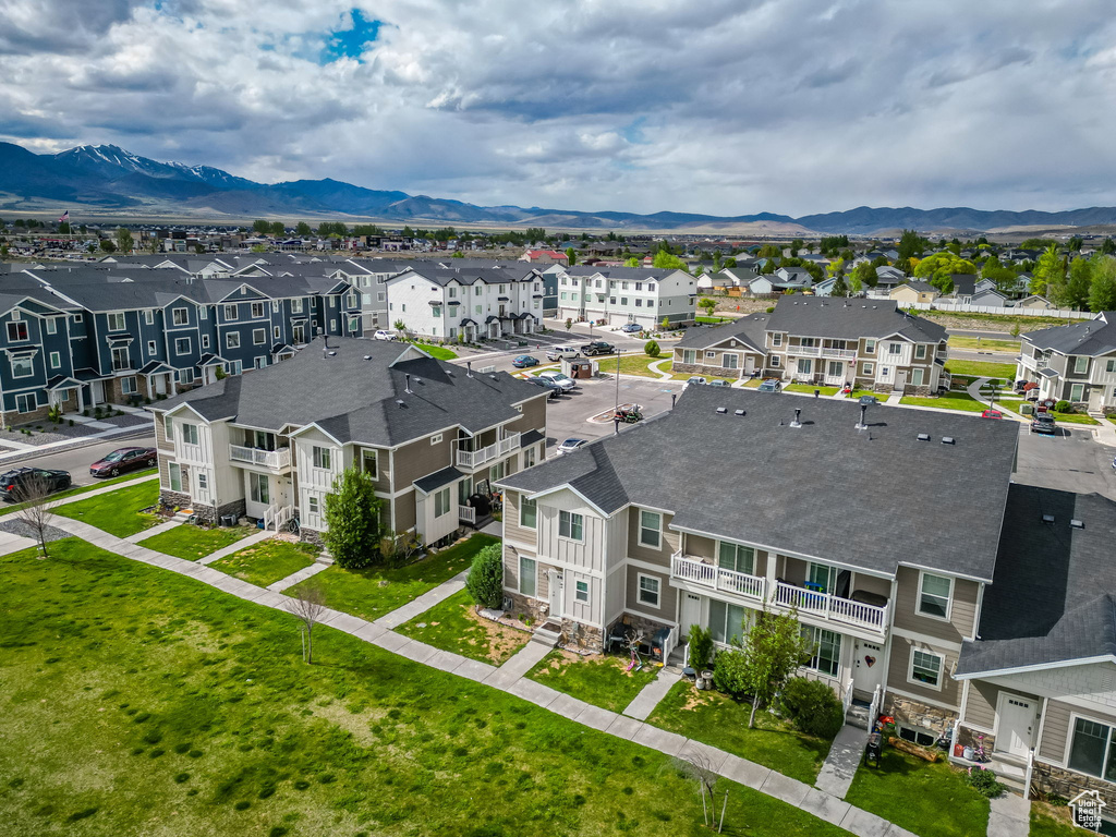 Aerial view of residential area with a mountain backdrop
