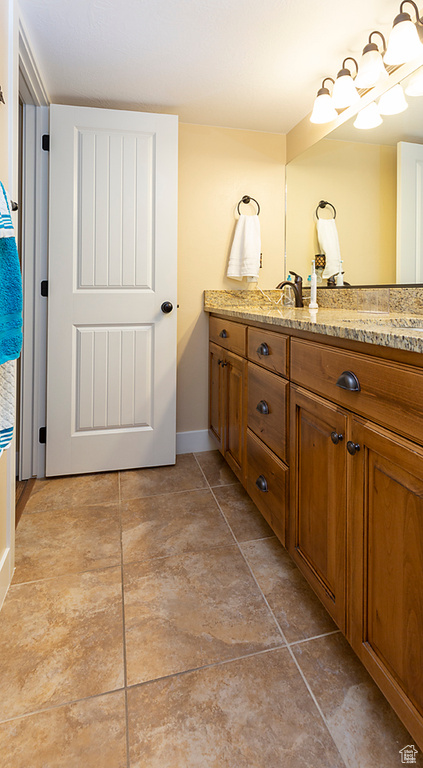 Bathroom with baseboards and vanity