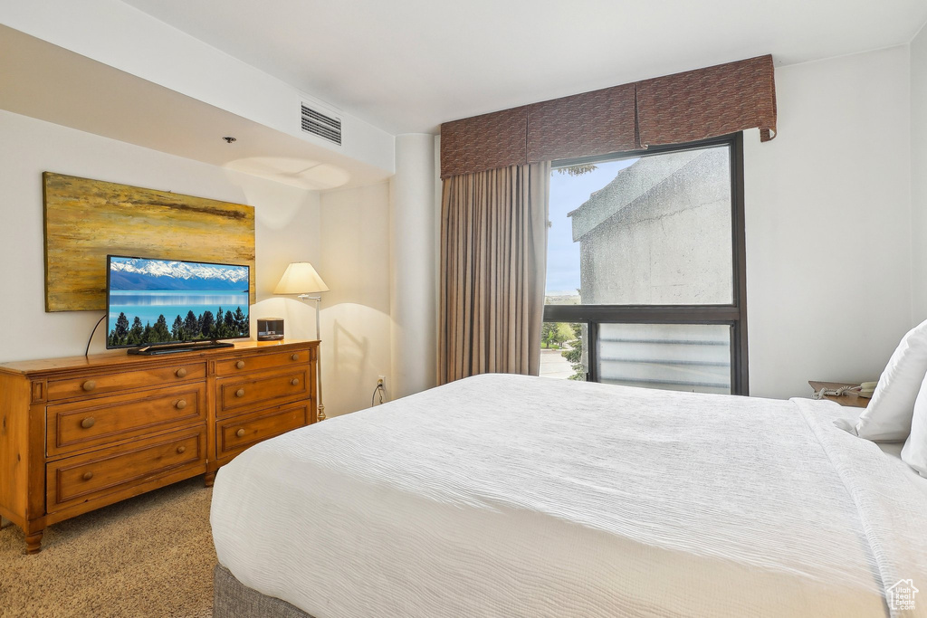Bedroom featuring carpet flooring