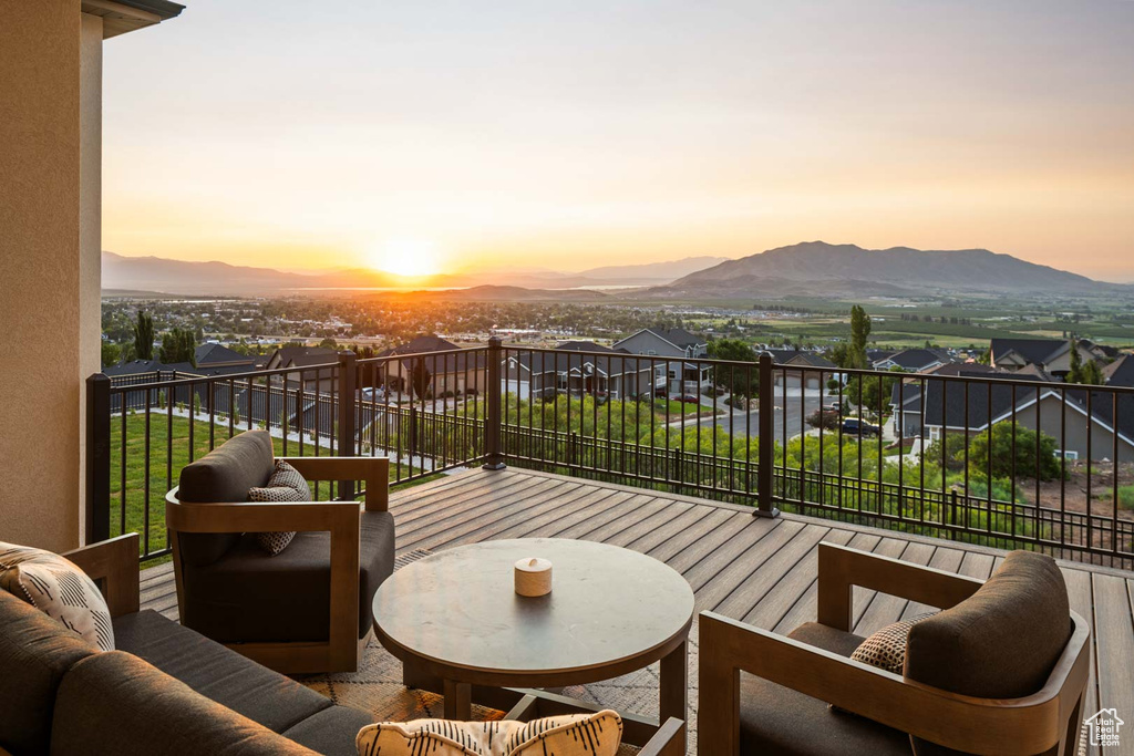 Balcony with a mountain view, a residential view, and an outdoor living space