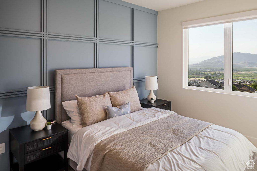 Bedroom with a mountain view