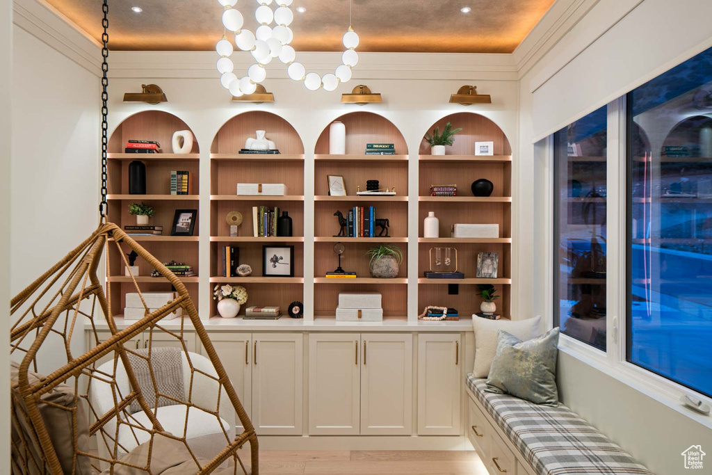 Wine room with light wood-type flooring