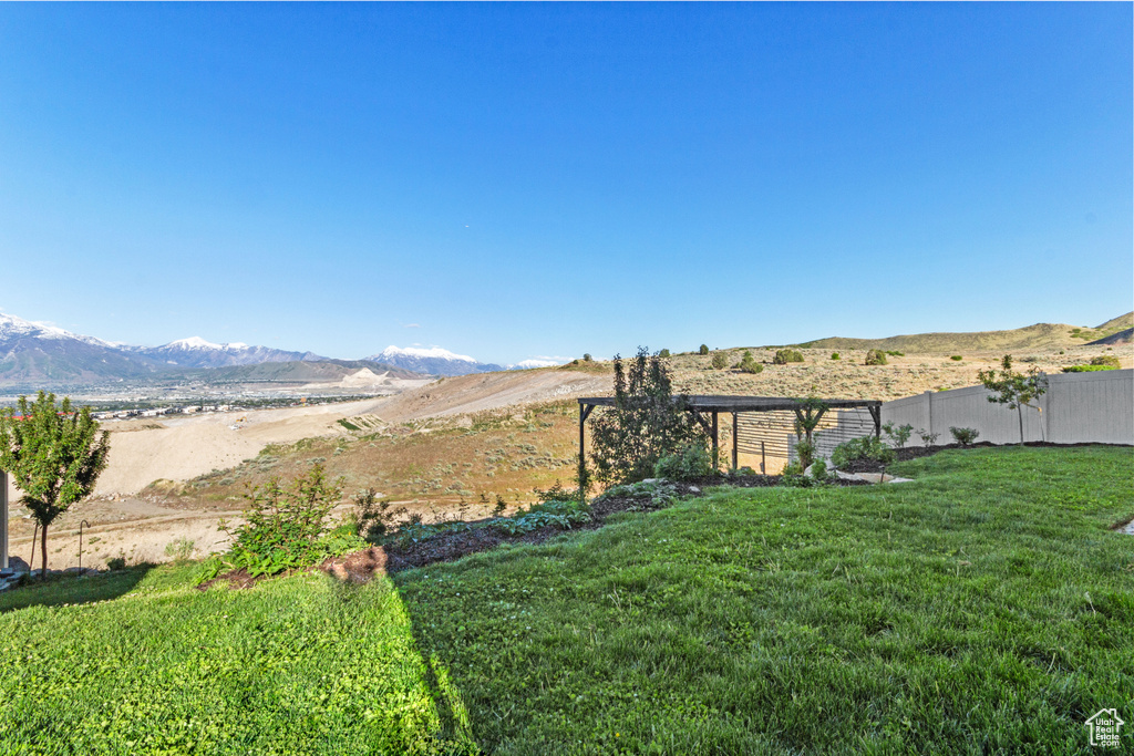View of yard with a mountain view