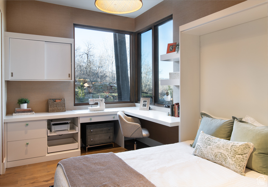Bedroom with light wood finished floors