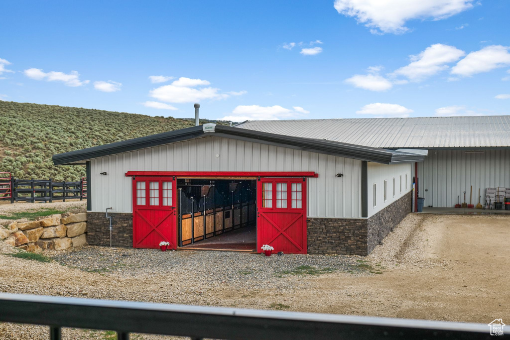 View of outbuilding featuring an exterior structure