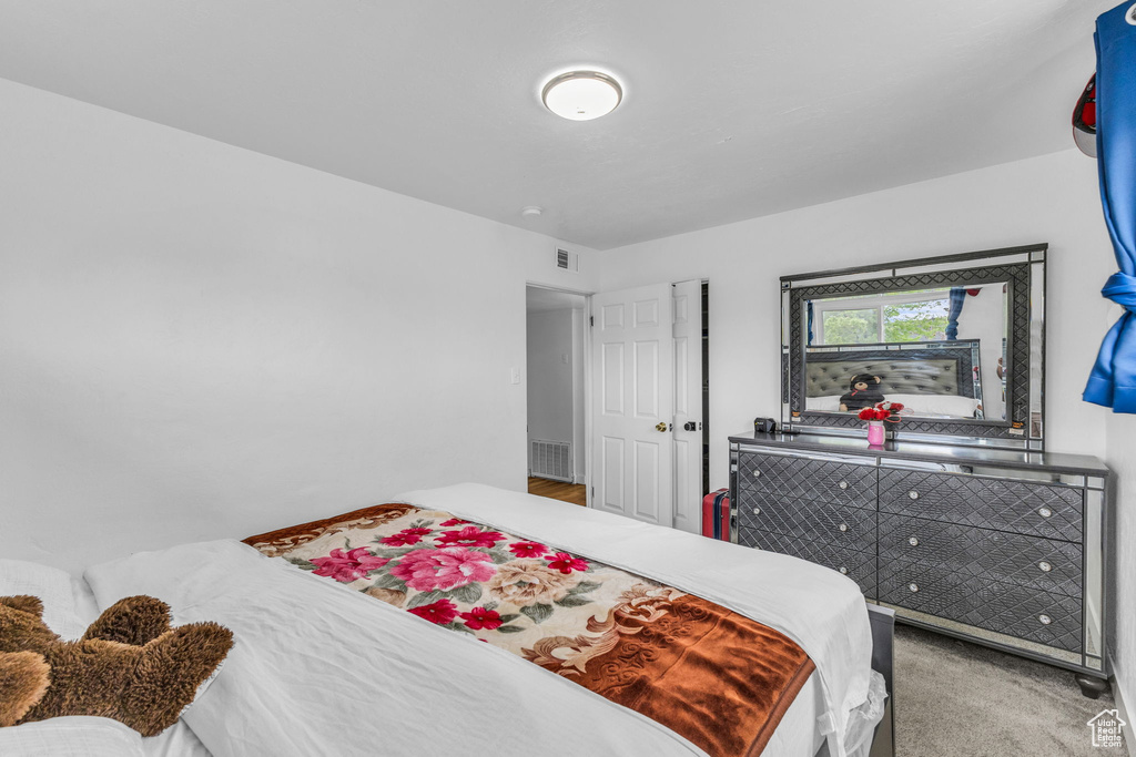 Bedroom with carpet flooring