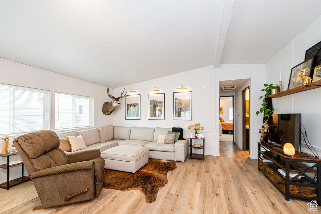 Living area with light wood-type flooring