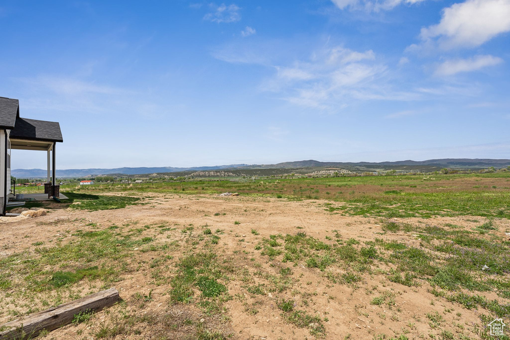 View of yard with a mountain view