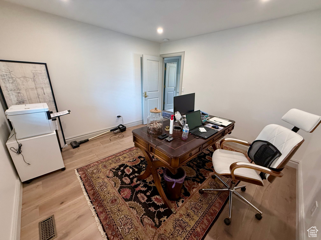 Office featuring light wood-style flooring, recessed lighting, and baseboards