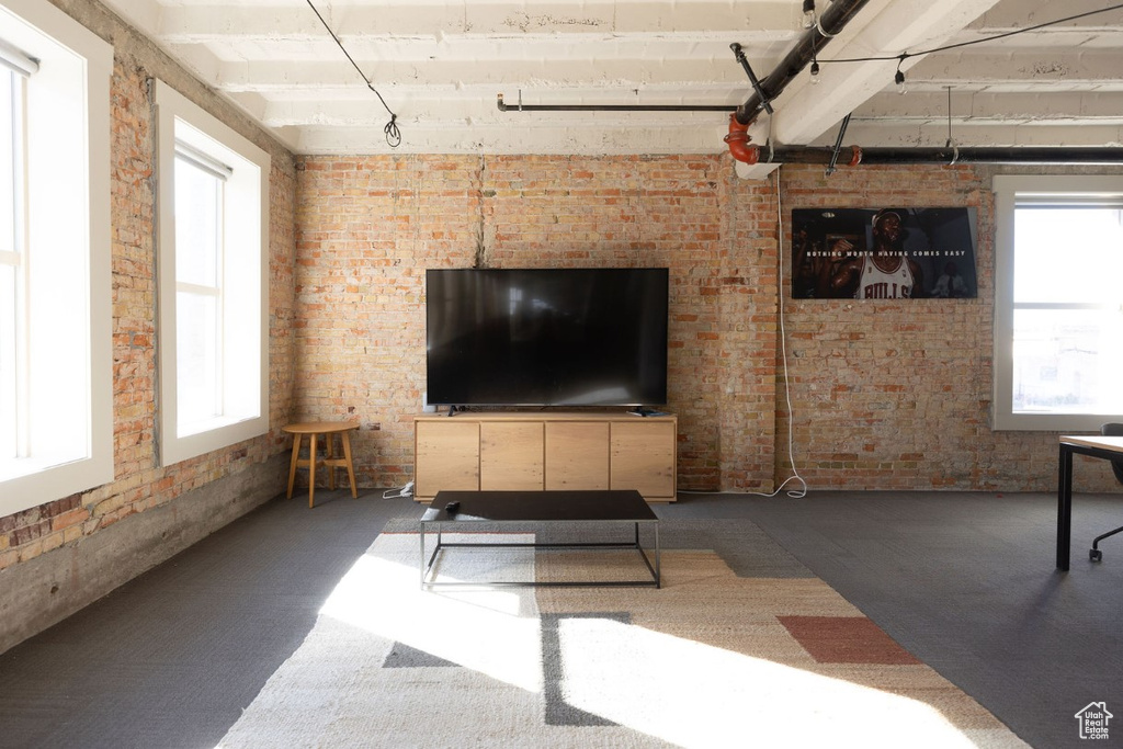 Living room with brick wall