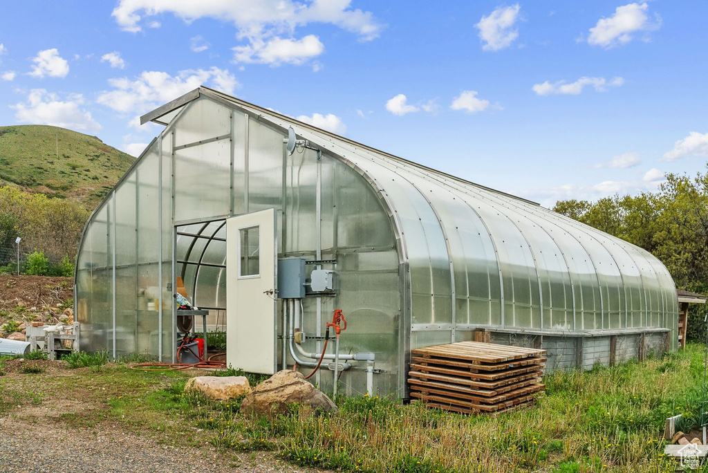 View of greenhouse with a mountain view