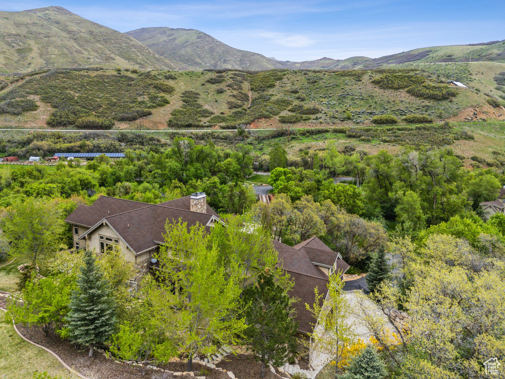 View of subject property featuring mountains