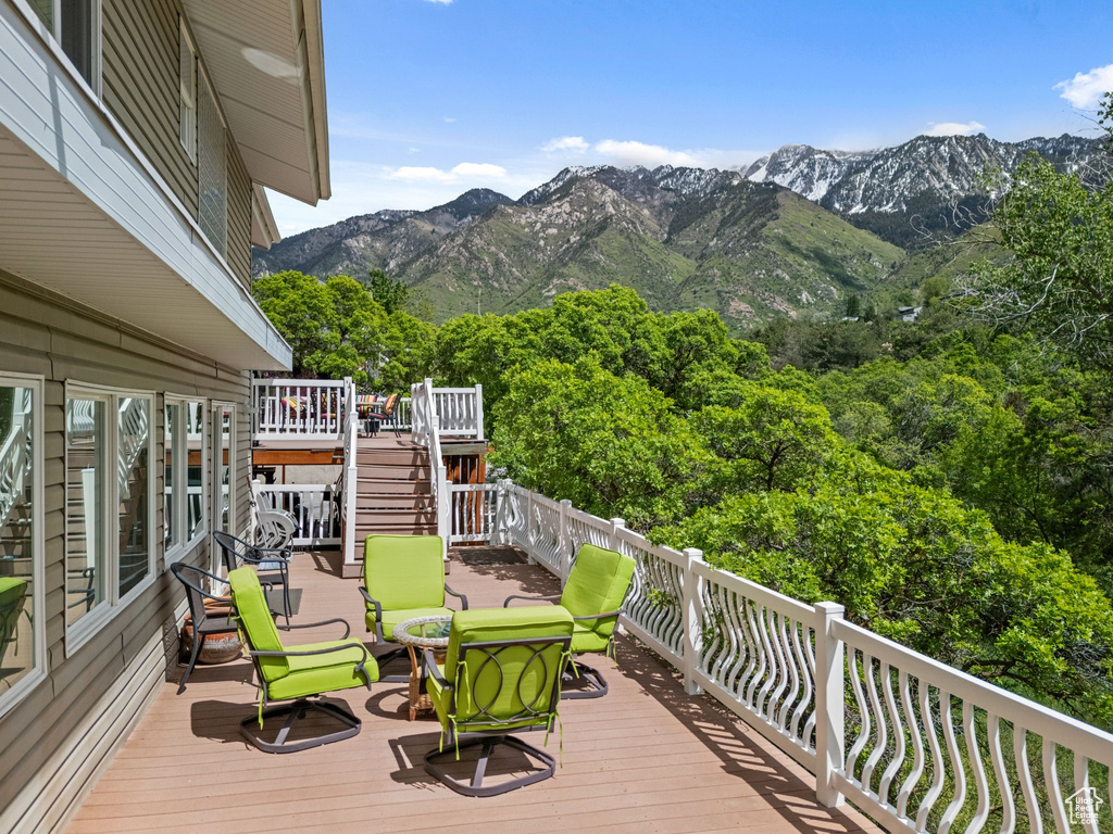 Wooden terrace with a mountain view and stairway