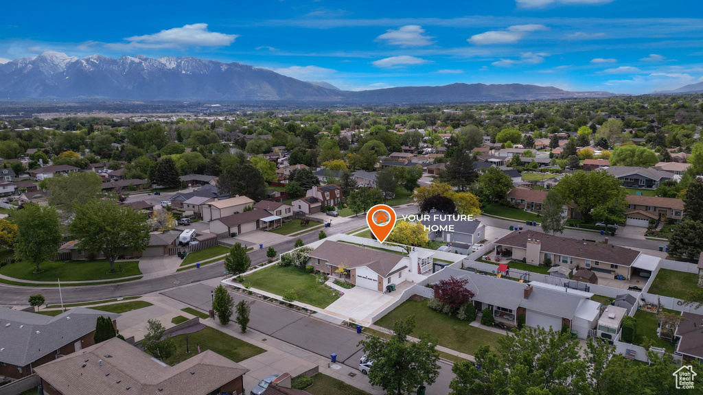 Aerial perspective of suburban area featuring mountains