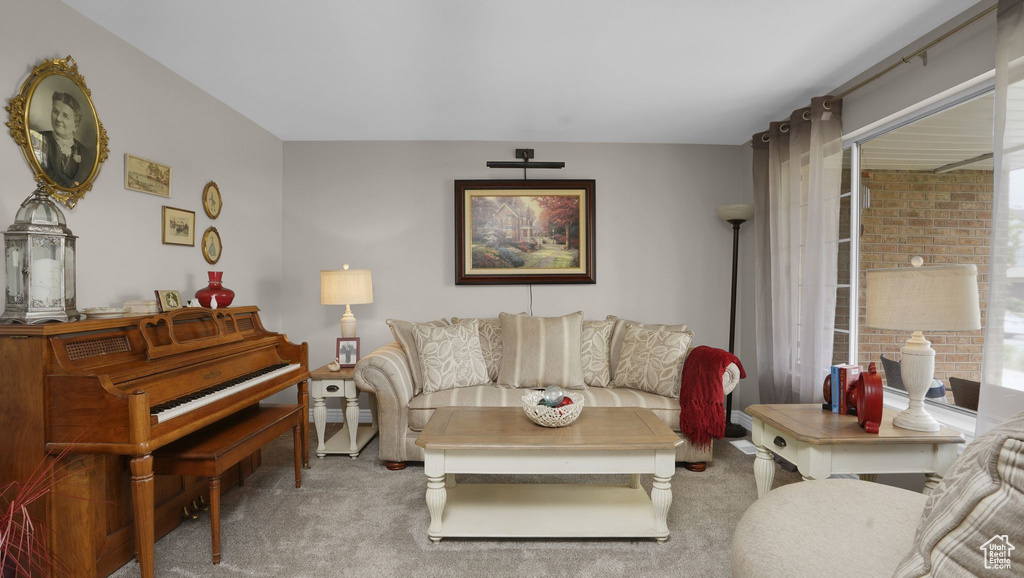 Living room featuring carpet flooring