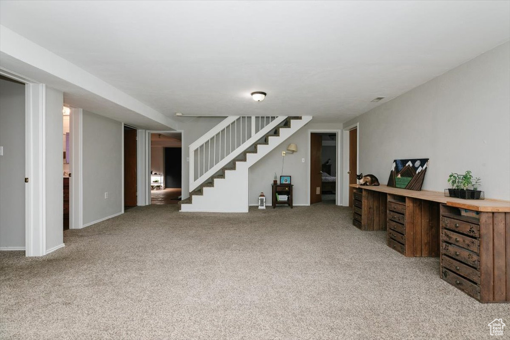 Office with carpet and baseboards
