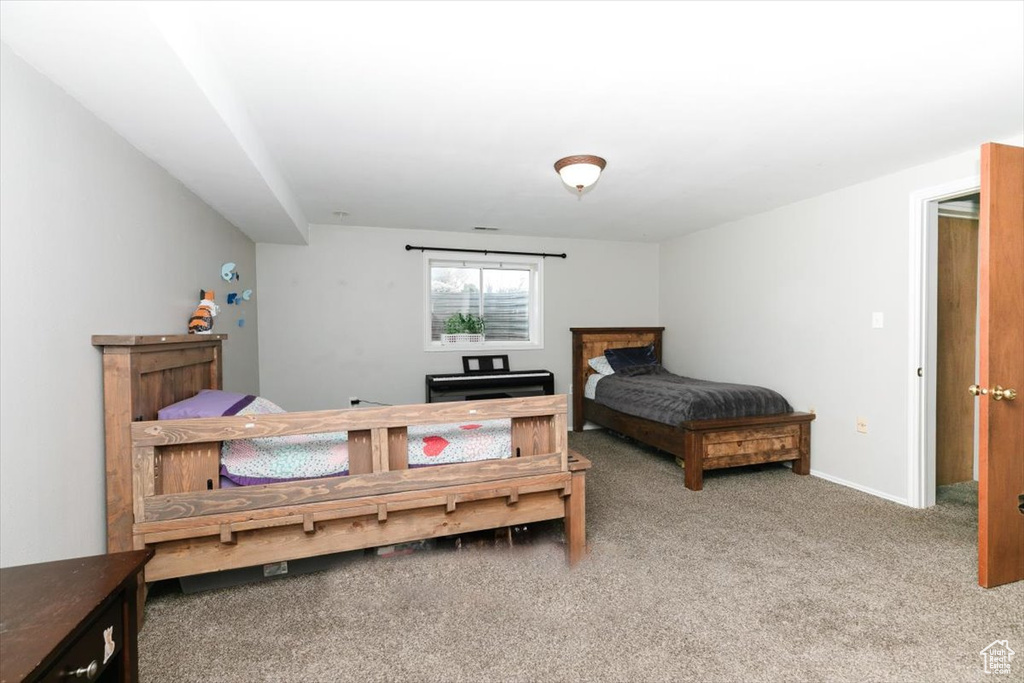View of carpeted bedroom
