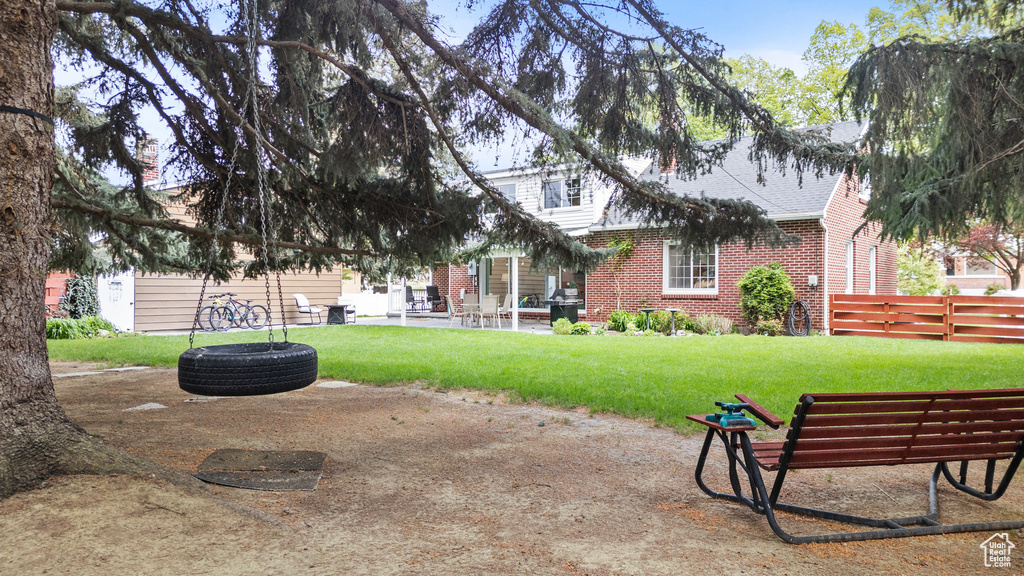View of yard with a patio