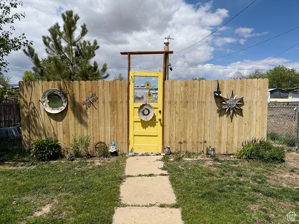 View of yard with a gate