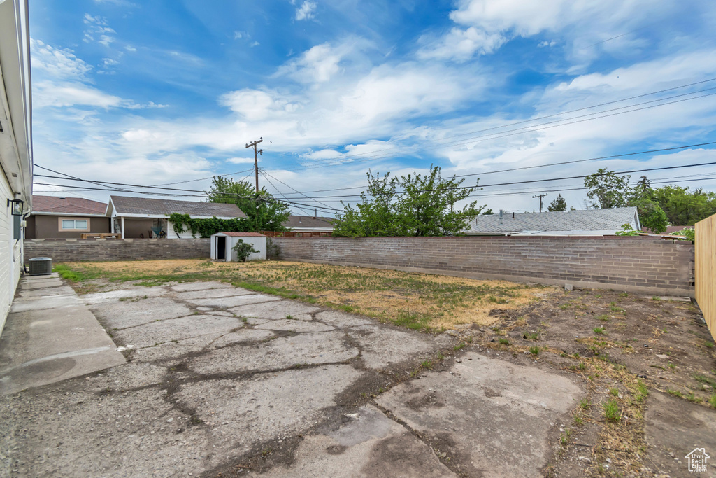 View of fenced backyard