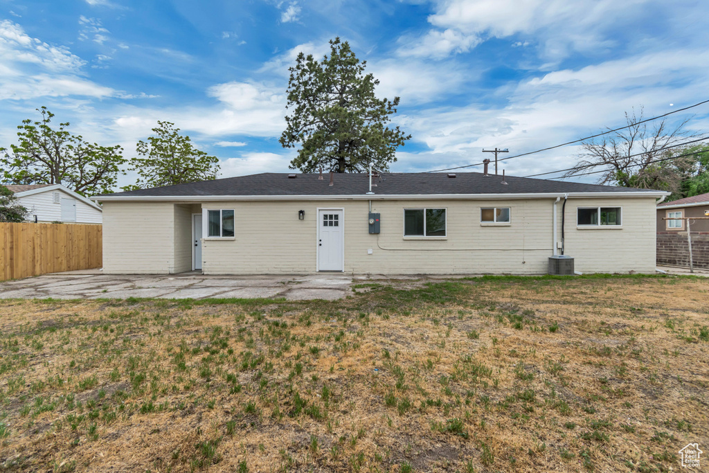 Rear view of property featuring a patio