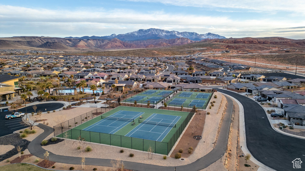 Aerial view of residential area featuring a mountain backdrop