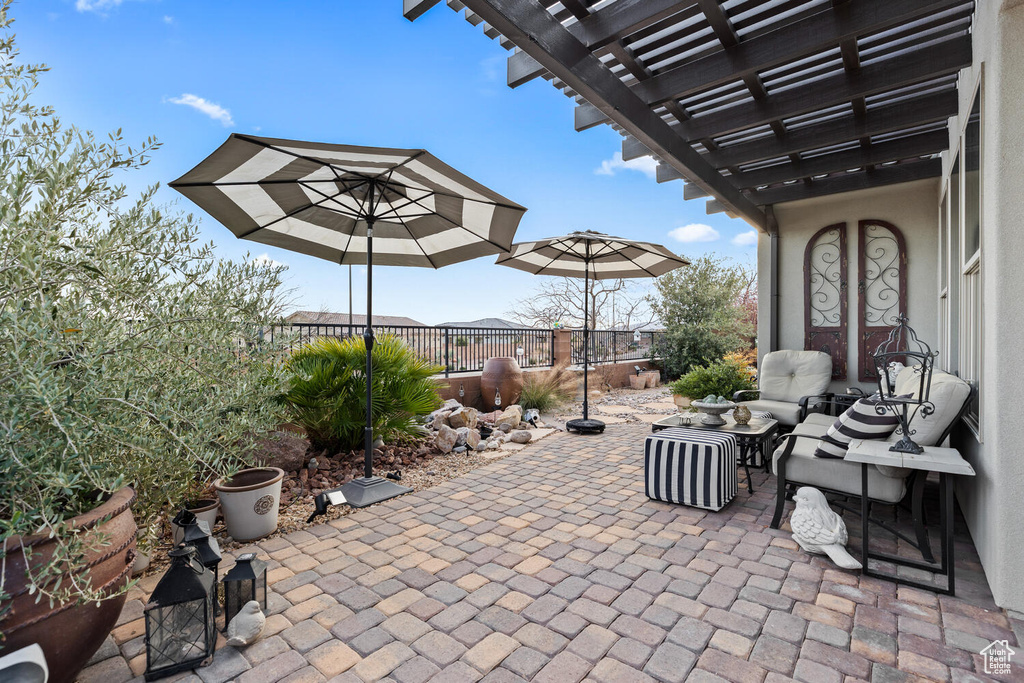 View of patio with a pergola