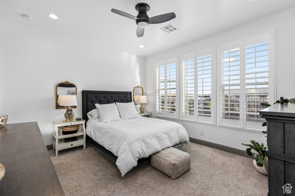 Bedroom with carpet floors, baseboards, a ceiling fan, and recessed lighting