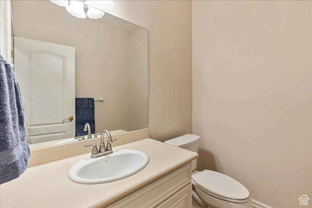 Bathroom featuring toilet and vanity