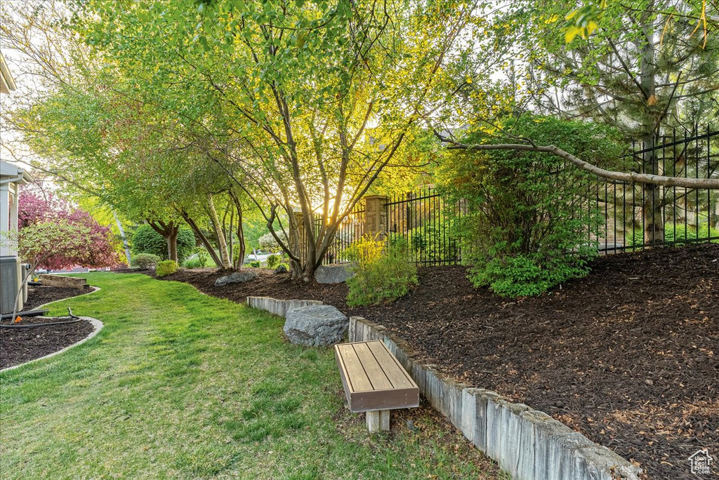View of yard featuring fence