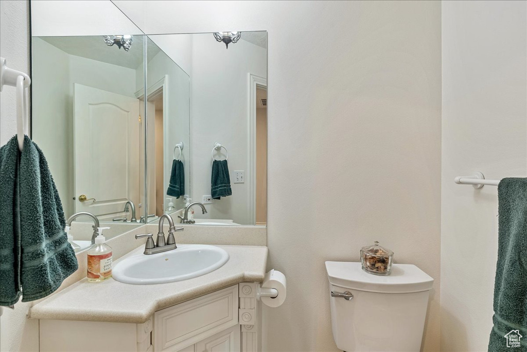 Bathroom featuring toilet and vanity