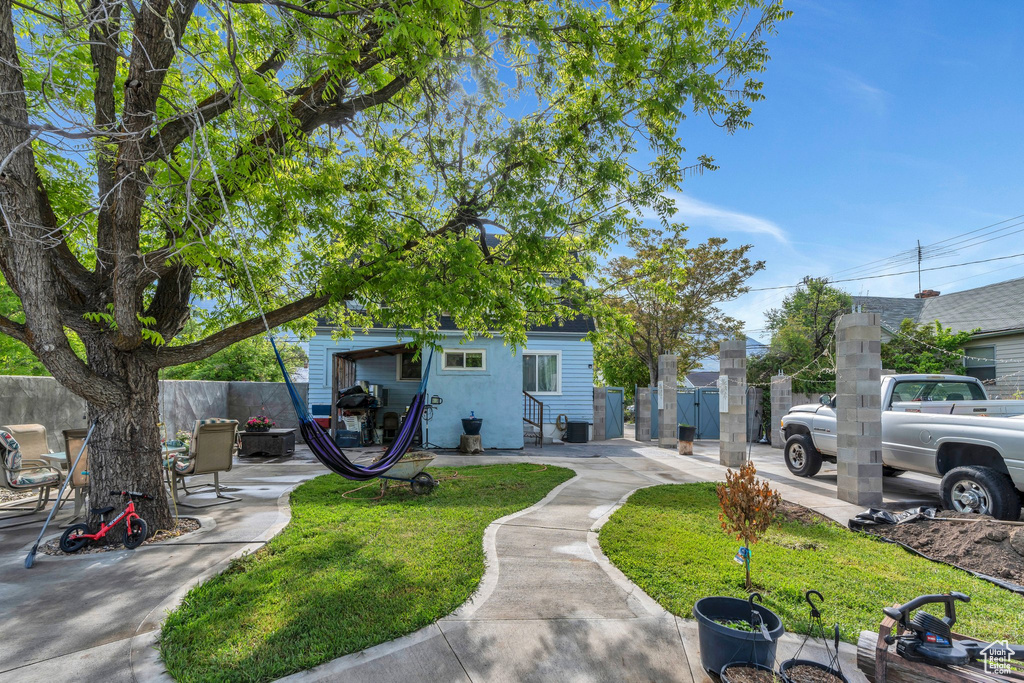 Fenced yard featuring a gate