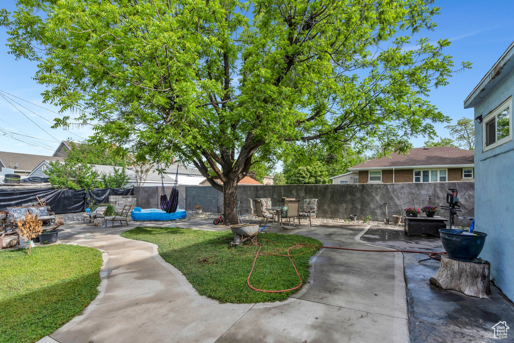 View of yard with a patio area