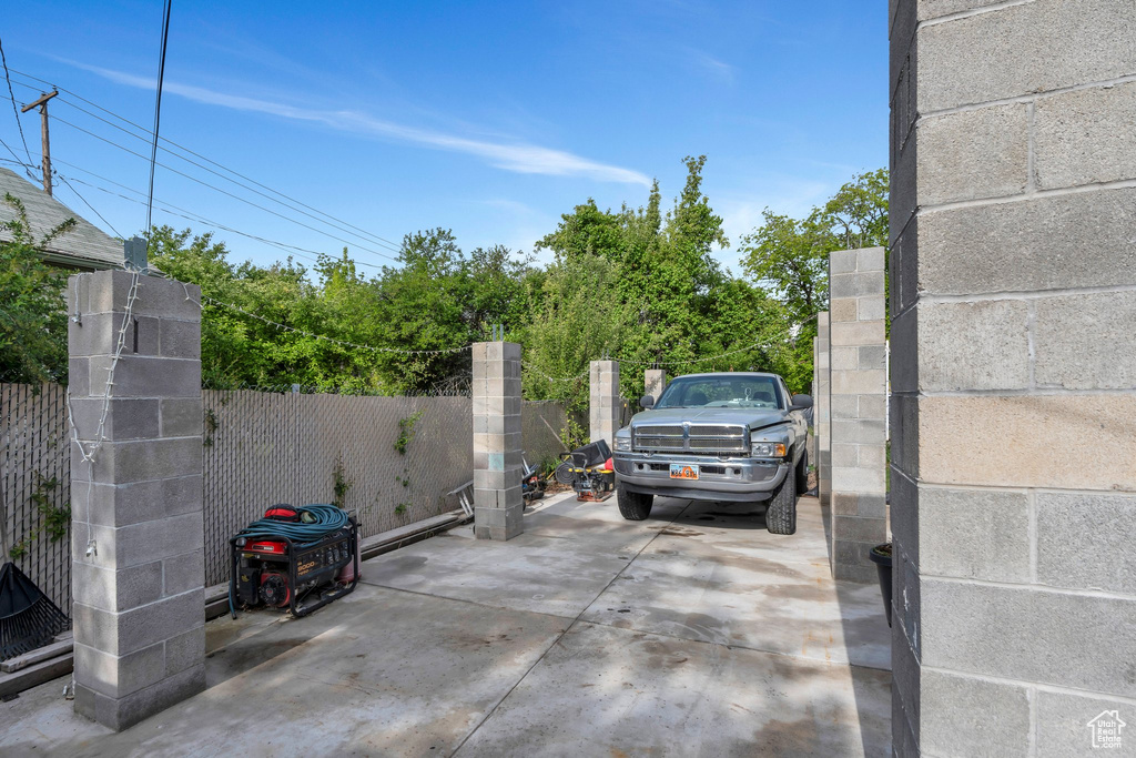 View of parking featuring fence