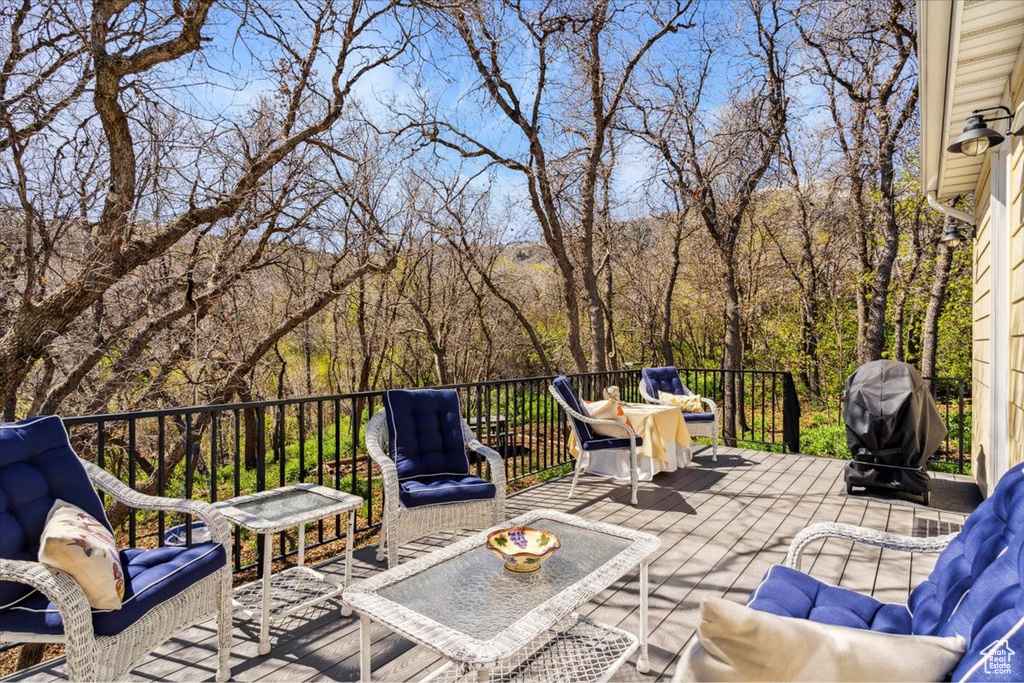 View of patio / terrace with outdoor lounge area, a deck, and area for grilling