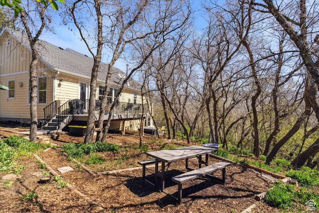 View of yard featuring a deck