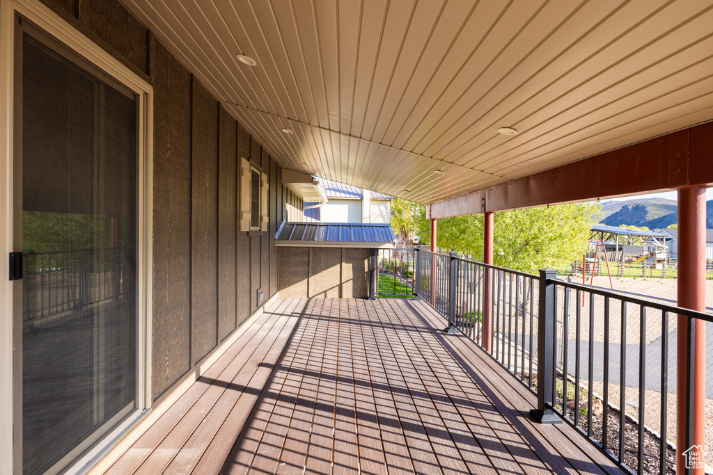 Wooden deck featuring a mountain view