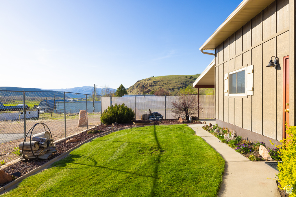 View of yard with a mountain view