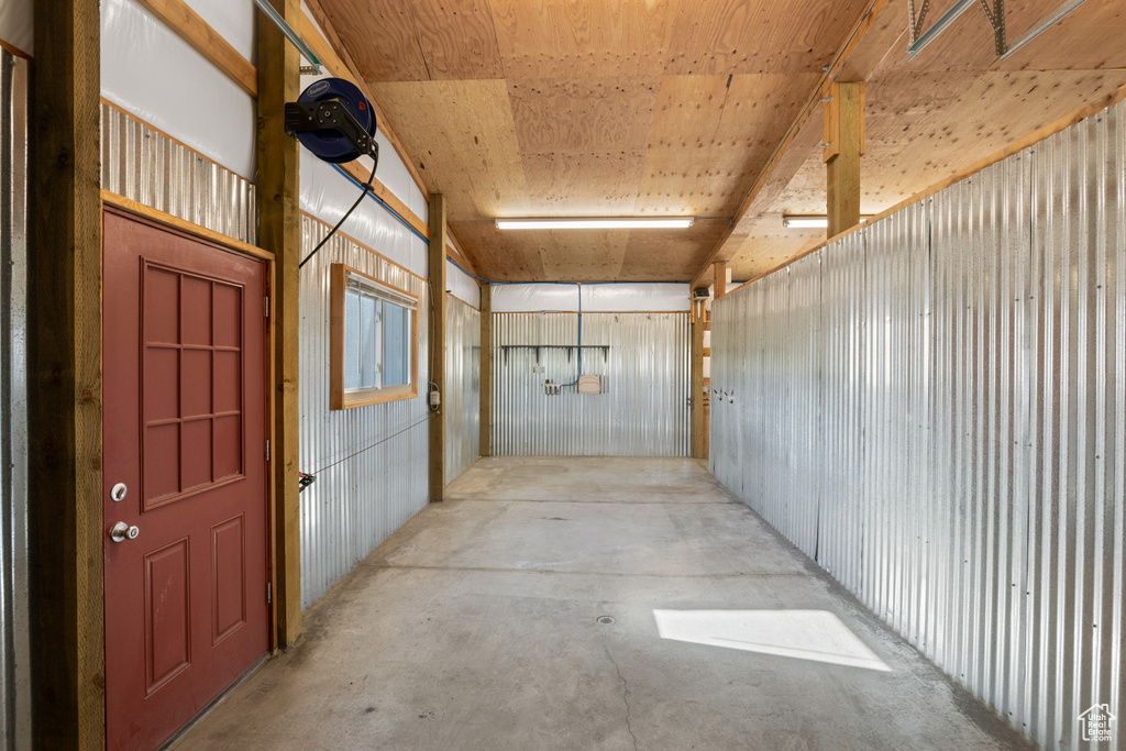 Hall featuring concrete flooring