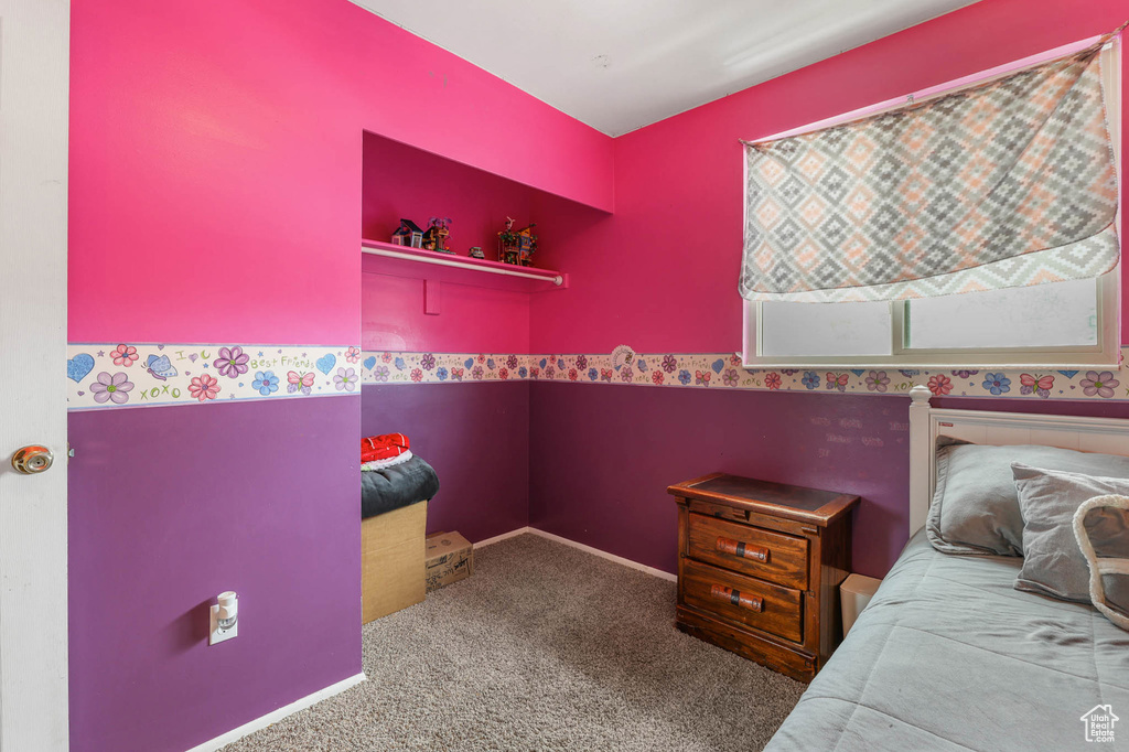 Bedroom featuring carpet floors