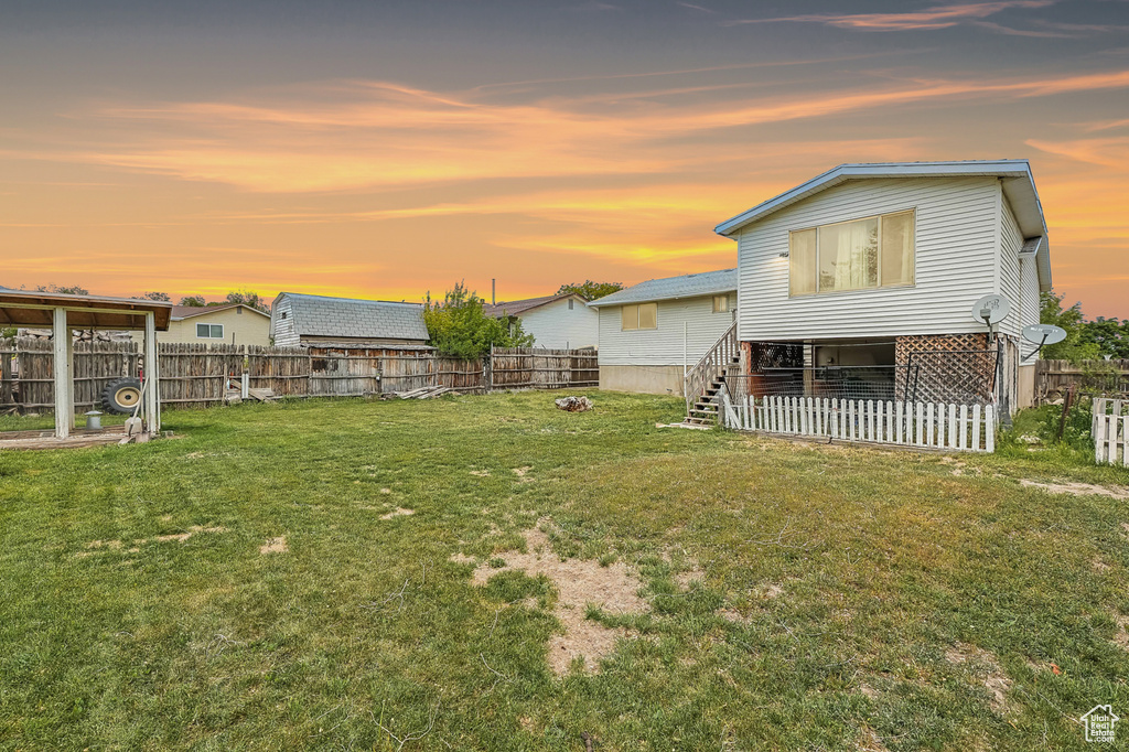 View of yard at dusk