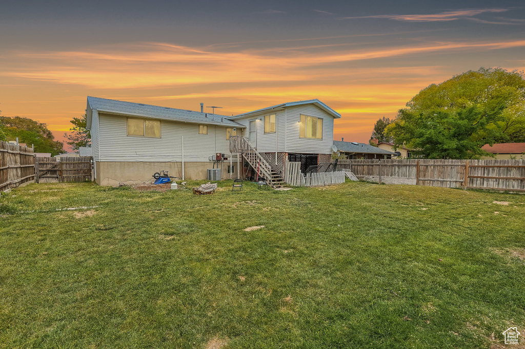 Back of property featuring stairs