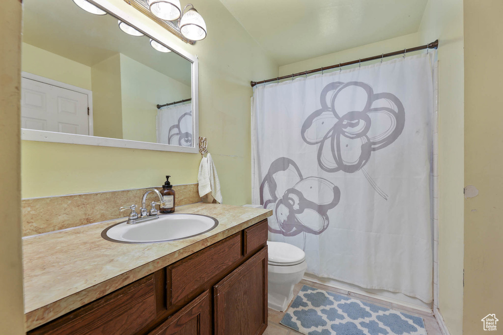 Bathroom with vanity and toilet