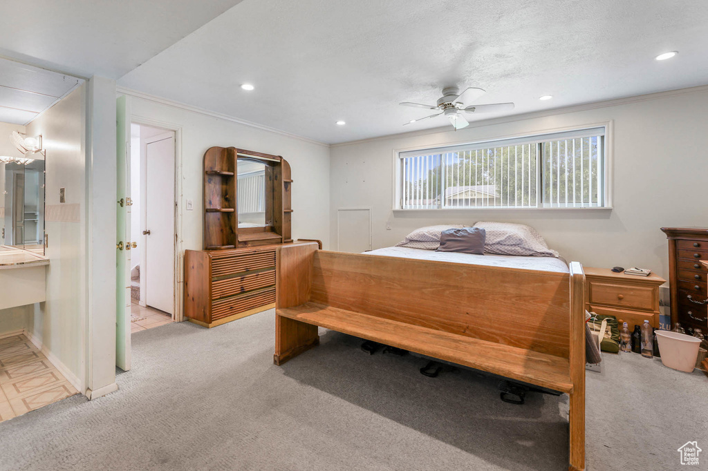 Bedroom featuring crown molding, light colored carpet, recessed lighting, and ceiling fan
