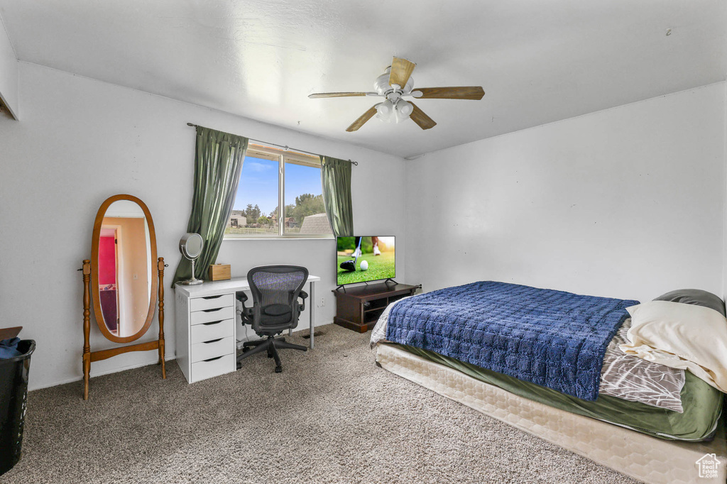 Bedroom featuring carpet floors and ceiling fan