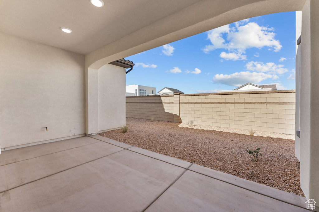 Fenced backyard featuring a patio area