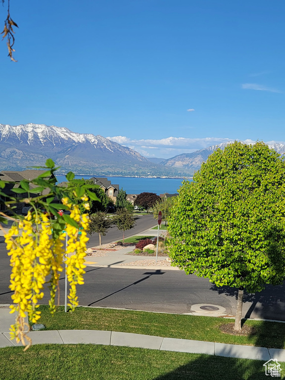 View of mountain background featuring a nearby body of water